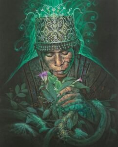 chamán con la planta Rapé Jurema preta en la mano