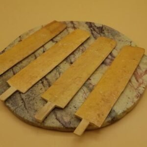 four kambo sticks on a platter